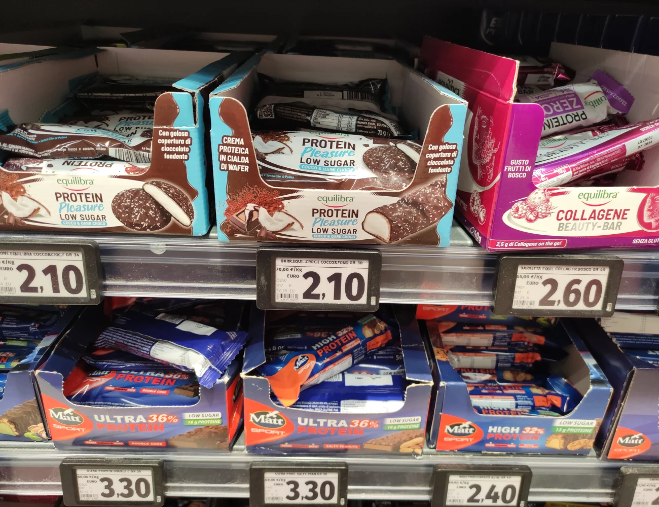 Protein and collagen snack bars displayed on supermarket shelves